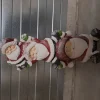Beelden|ohgreen 3 kerstmannen op elkaar met lichtjes